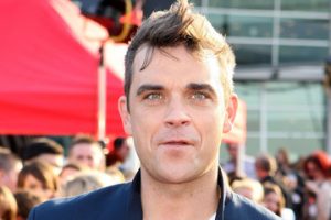 Robbie Williams canta You Know Me